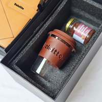 Corporate gift hamper with coffee mug, diary, and munchies