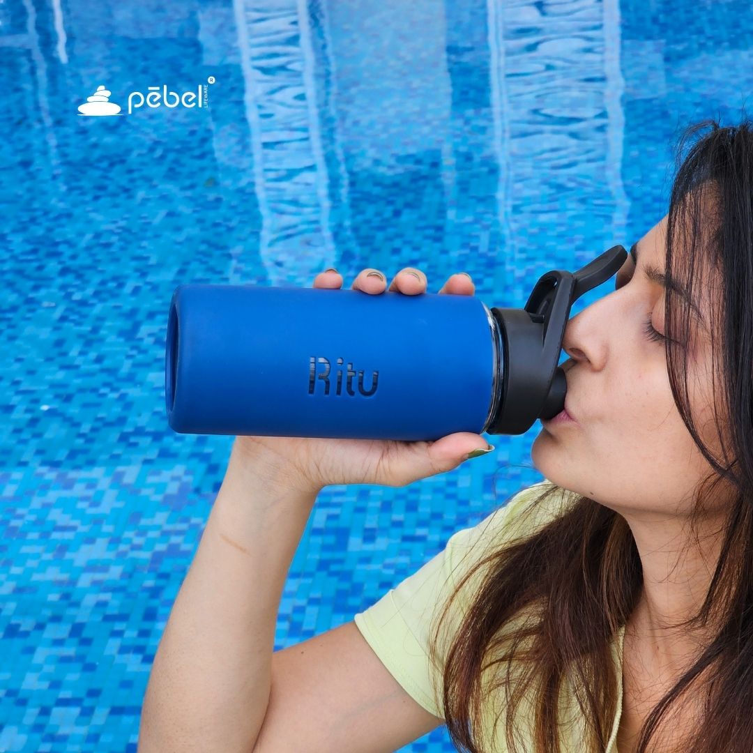 Custom glass water bottle with soft silicone cover
