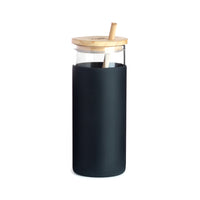 Glass tumbler with wooden straw and lid