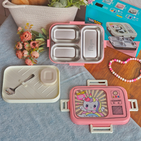 Steel lunch box with Radio Bento design, four compartments, and spoon