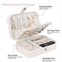 Travel jewelry box with compartments for rings and necklaces