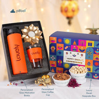 personalized glass bottle diwali gift, orange silicone sleeve water bottle, viral glass diwali hamper, gold lotus diya gift set, diwali festive gift box