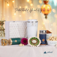 Budget friendly Healthy Diwali hamper with trail mix, dry fruits,travel mug, and diya