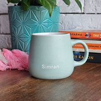 Custom ceramic mug in soft pastel color