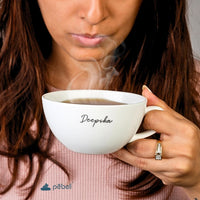 White ceramic coffee mug by Pebel Lifeware