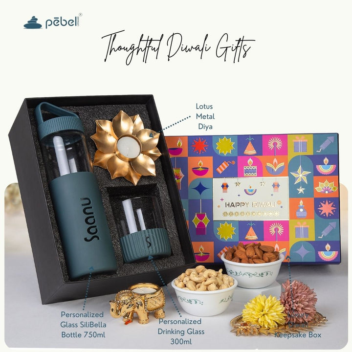 Gift set with personalized glass bottle, drinking glass, and decorative items for Pebel Lifeware