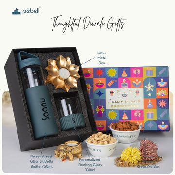 Gift set with personalized glass bottle, drinking glass, and decorative items for Pebel Lifeware