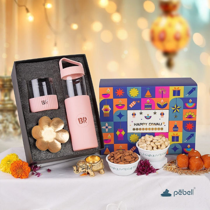 Stylish Diwali hamper with eco-friendly bottles, festive gift box, and healthy dry fruits