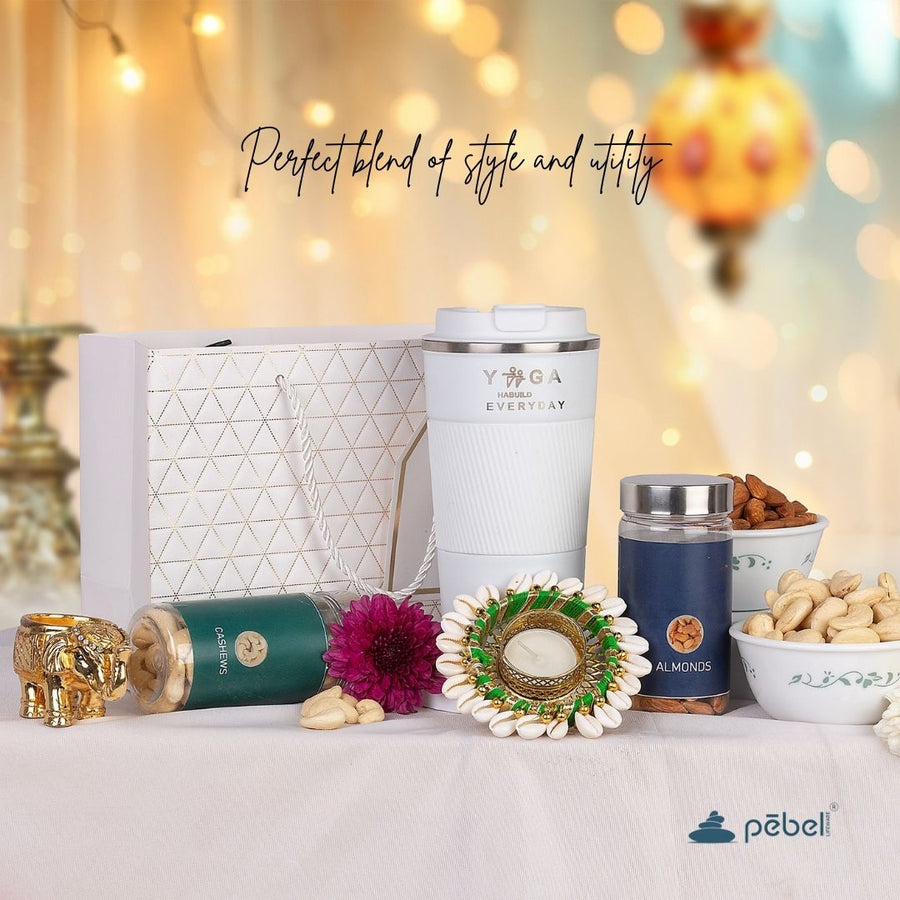Budget friendly Healthy Diwali hamper with trail mix, dry fruits,travel mug, and diya