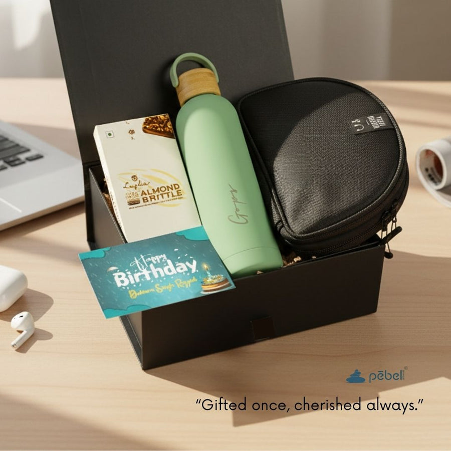 Gift set with vacuum steel water bottle, tech pouch, and birthday card.