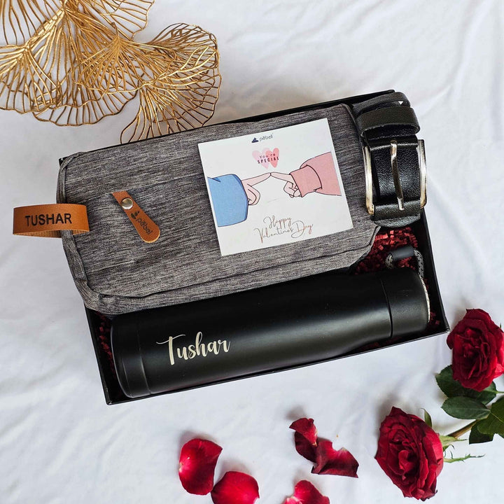 Premium gift box with personalized bottle, shaving pouch, and belt.
